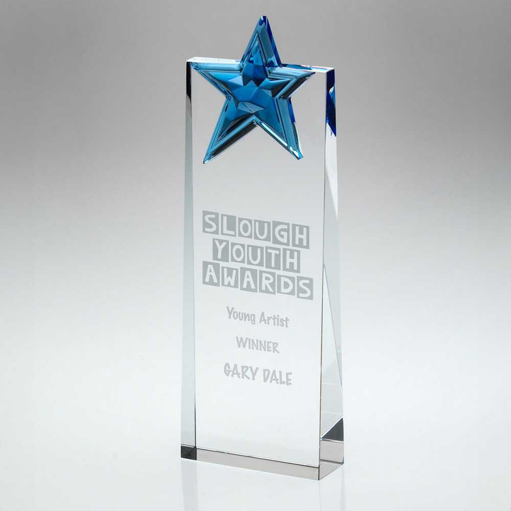 CLEAR GLASS WEDGE WITH BLUE GLASS STAR - 9in
